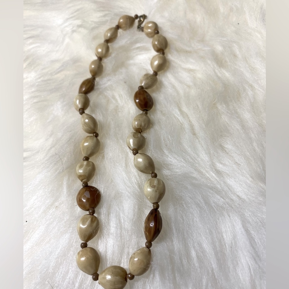 Necklace made of nut or seed